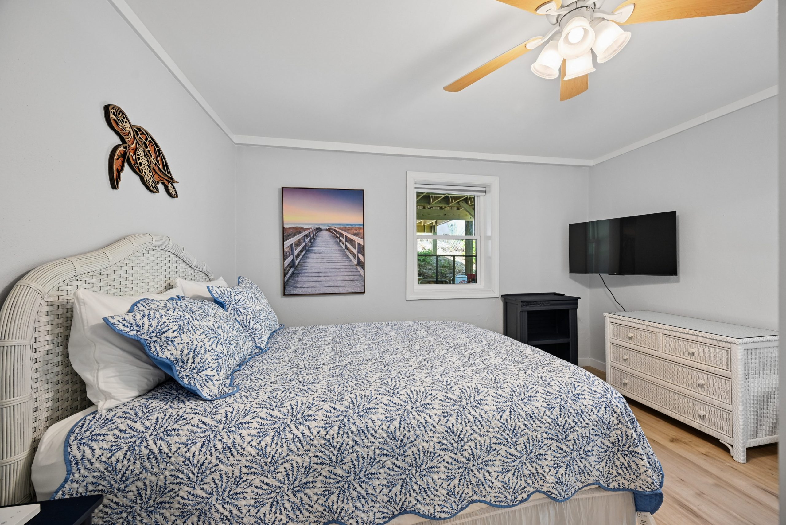 Queen bedroom suite on ground floor includes private half bath and 43" Roku Smart TV with Spectrum Cable TV